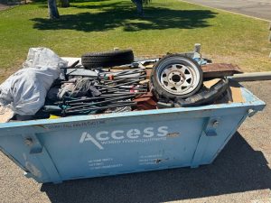 This skip bin full of rubbish plus a trailer load already taken to the tip